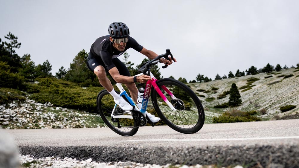 cyclist climbing hill