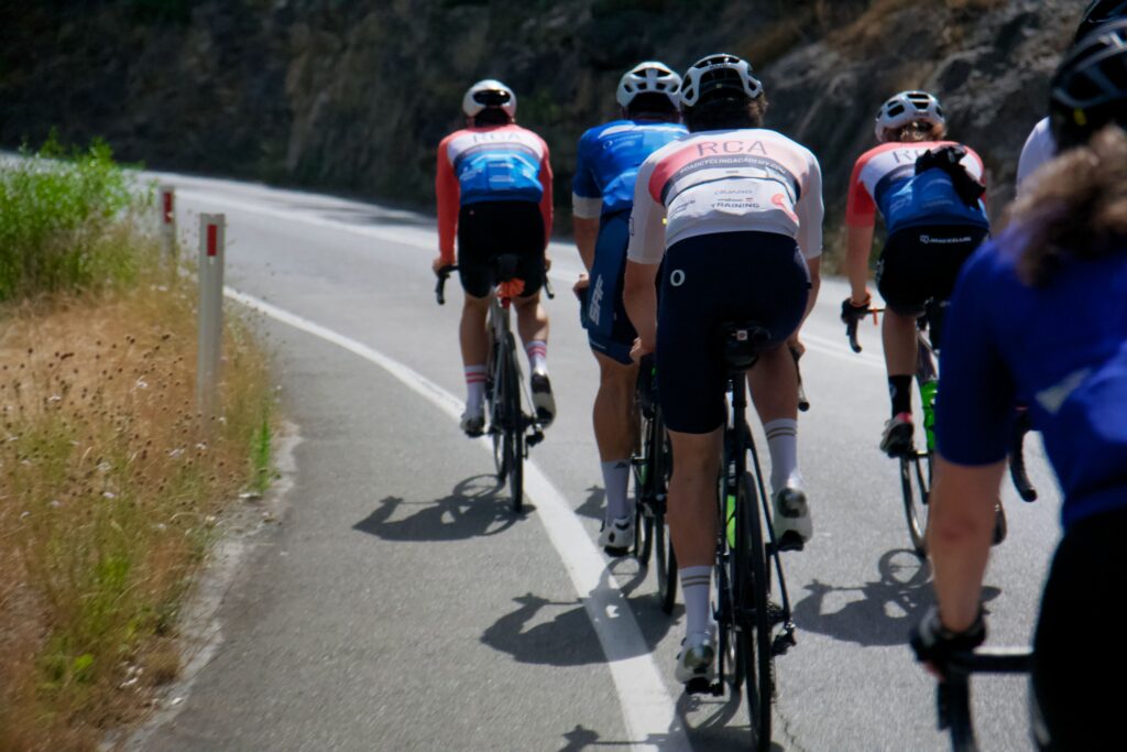 group cycling climb