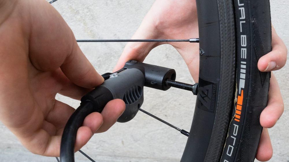 inflating bicycle tire